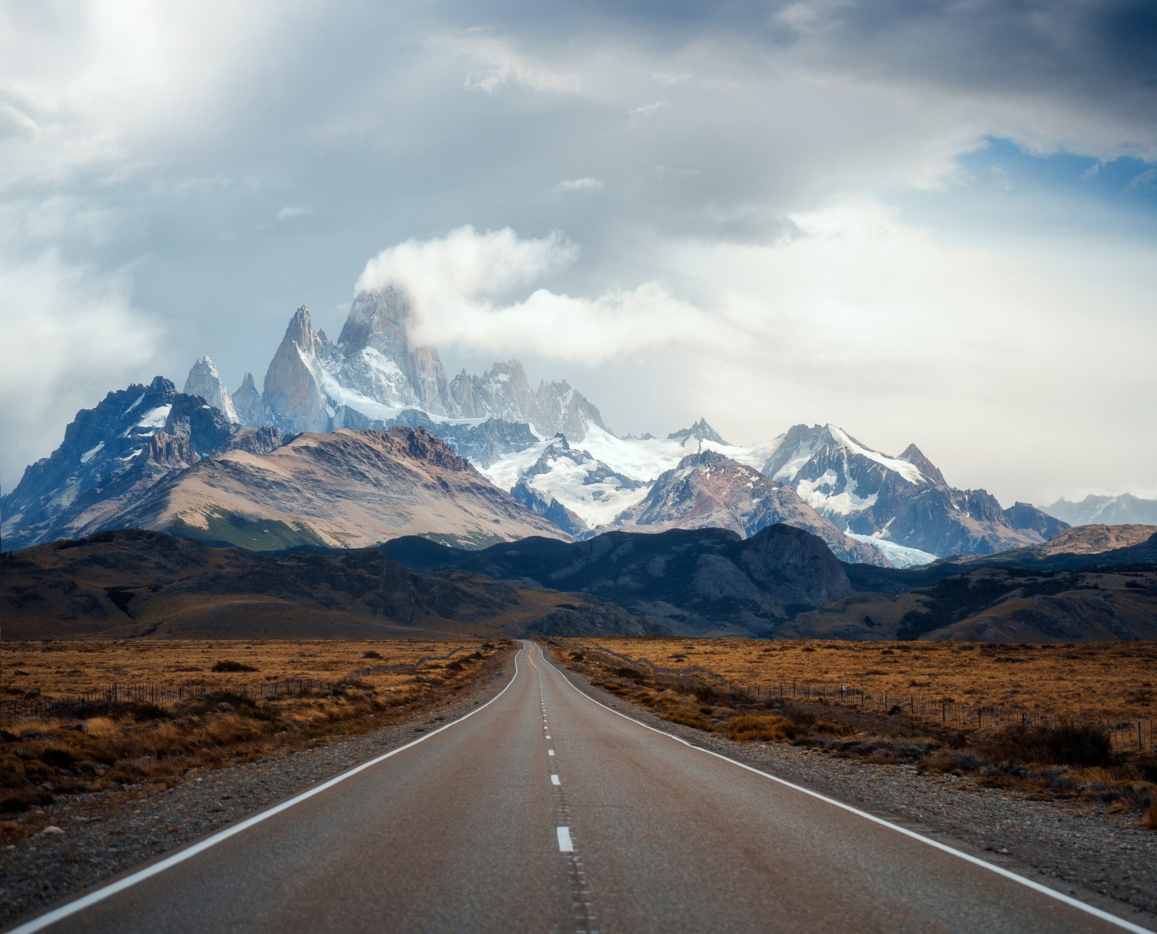 View of long road leading to mountain
