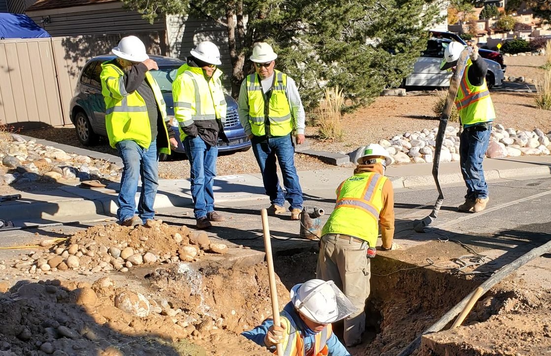 utility workers working on water main improvements